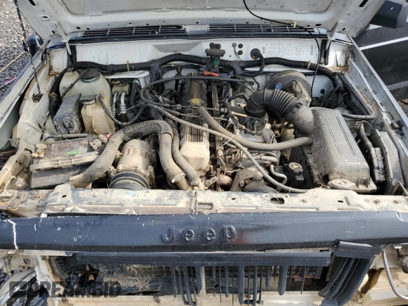 1994 Jeep Cherokee Sport with VIN 1J4FT68S0RL234669, listed as a Copart auction lot 44044555 with 282,179 mi miles and Salvage title. Bid and sale history available at DreamBid. Image 11.
