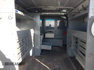 2009 Ford Econoline Cargo with VIN 1FTNE24L79DA86615, listed as a IAAI auction lot 41969289 with 158,267 mi miles and . Bid and sale history available at DreamBid. Image 13.