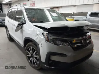 2020 Honda Pilot Touring 8-Passenger with VIN 5FNYF5H92LB014473, listed as a IAAI auction lot 42711125 with 50,117 mi miles and . Bid and sale history available at DreamBid. Image 1.