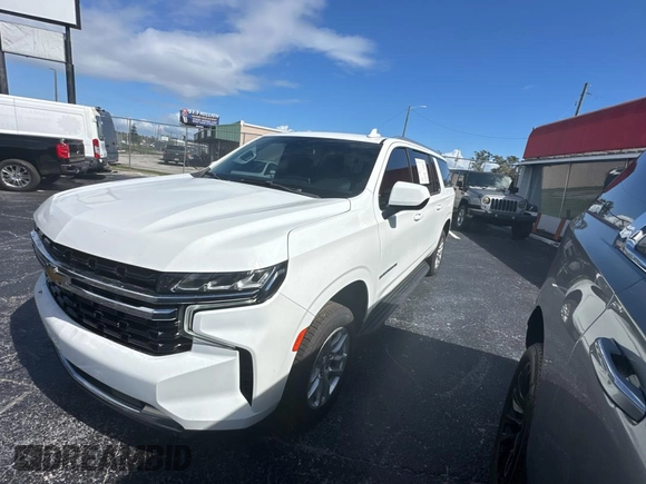 2021 Chevrolet Suburban LS with VIN 1GNSCBKD7MR301059, listed as a Copart auction lot 77436554 with 54,279 mi miles and Clean Title. Bid and sale history available at DreamBid. Image 2.