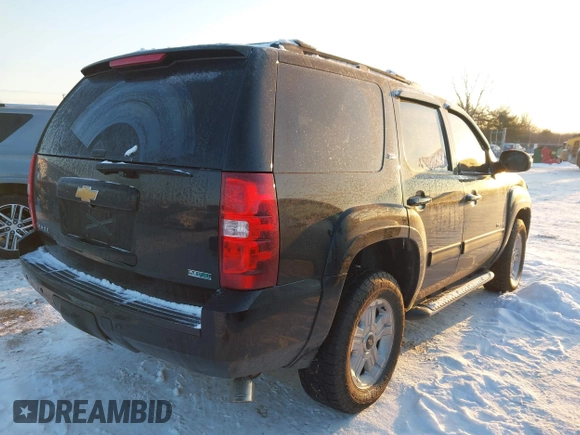 2012 Chevrolet Tahoe LT with VIN 1GNSKBE09CR295291, listed as a IAAI auction lot 41261810 with 133,400 mi miles and . Bid and sale history available at DreamBid. Image 4.