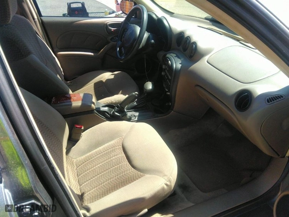 2004 Pontiac Grand Am SE1 with VIN 1G2NF52E74M507328, listed as a IAAI auction lot 42012666 with 157,263 mi miles. Bid and sale history available at carsss.com. Image 5.
