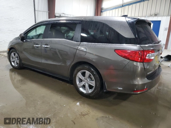 2018 Honda Odyssey EX-L z VIN 5FNRL6H77JB013494, wystawiony jako Copart lot #56348745 z przebiegiem 21 368 mil mil oraz Szkoda całkowita • Salvage title. Historia ofert i sprzedaży dostępna na DreamBid. Obrazek 2.