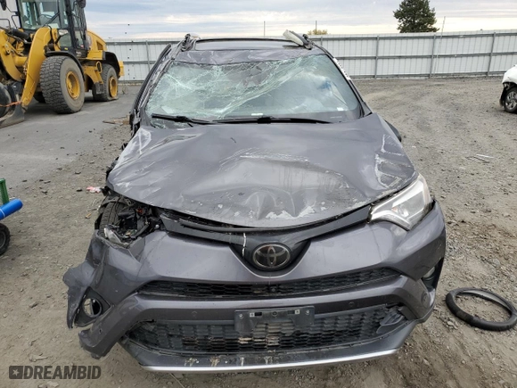 2016 Toyota RAV4 SE with VIN JTMJFREV9GJ088756, listed as a Copart auction lot 69210994 with 0 mi miles and Salvage Title. Bid and sale history available at carsss.com. Image 5.