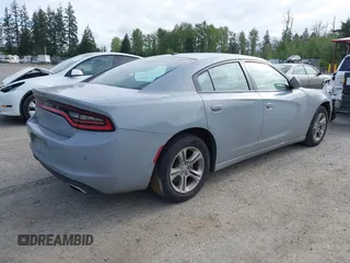 2022 Dodge Charger SXT with VIN 2C3CDXBG4NH201640, listed as a IAAI auction lot 42161657 with 48,690 mi miles and . Bid and sale history available at DreamBid. Image 4.