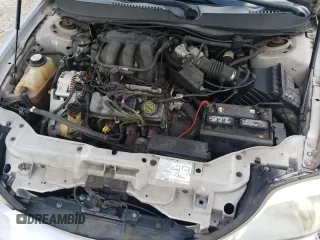 2004 Mercury Sable GS z VIN 1MEFM50UX4A619346, wystawiony jako Copart lot #71295284 z przebiegiem 71 883 mil mil oraz Szkoda całkowita • Salvage title. Historia ofert i sprzedaży dostępna na DreamBid. Obrazek 12.