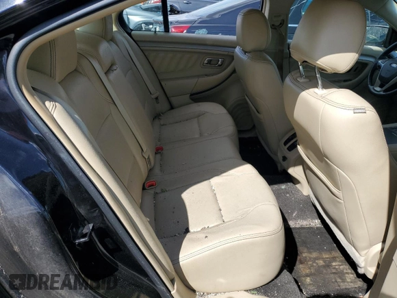 2016 Ford Taurus SEL z VIN 1FAHP2E9XGG117710, wystawiony jako Copart lot #57914095 z przebiegiem 131 344 mil mil oraz Szkoda całkowita • Salvage title. Historia ofert i sprzedaży dostępna na DreamBid. Obrazek 10.