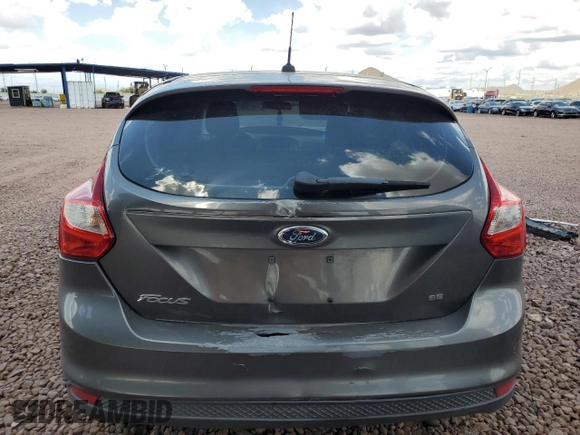 2012 Ford Focus SE z VIN 1FAHP3K24CL338153, wystawiony jako Copart lot #56161925 z przebiegiem 167 146 mil mil oraz Szkoda całkowita • Salvage title. Historia ofert i sprzedaży dostępna na DreamBid. Obrazek 6.