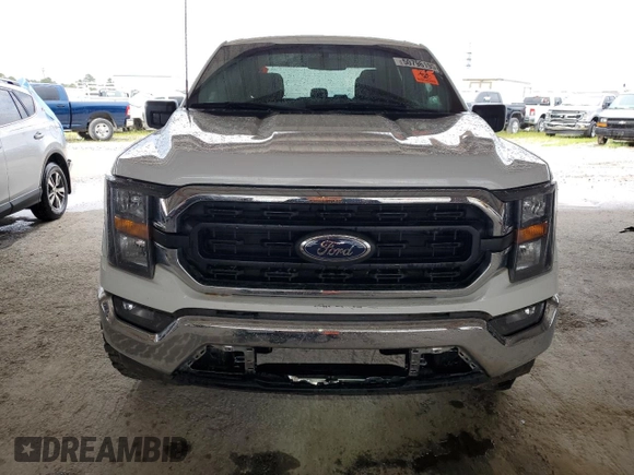 2023 Ford F-150 XL with VIN 1FTFW1E59PKE35312, listed as a Copart auction lot 50796195 with 19,849 mi miles and Salvage Title. Bid and sale history available at carsss.com. Image 5.