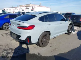 2023 BMW X4 M with VIN 5YM23EC0XP9P23425, listed as a IAAI auction lot 41147096 with 22,958 mi miles. Bid and sale history available at carsss.com. Image 4.