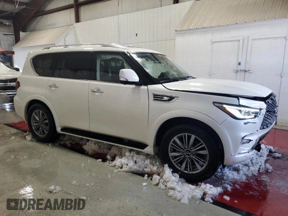 2024 Infiniti QX80 LUXE with VIN JN8AZ2AE4R9328082, listed as a Copart auction lot 41964375 with 27,999 mi miles and Salvage Title. Bid and sale history available at carsss.com. Image 4.