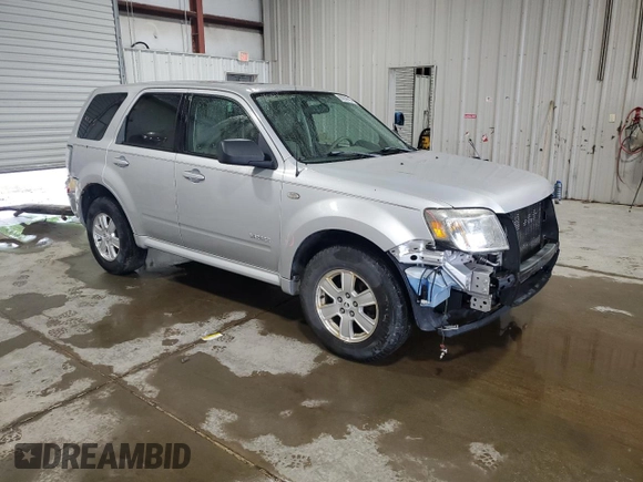 2008 Mercury Mariner с VIN 4M2CU91138KJ15103, выставлен на аукционе Copart как лот 60039585 с пробегом 157 481 миль миль и Списание • Salvage title. История ставок и продаж доступна на DreamBid. Изображение 4.