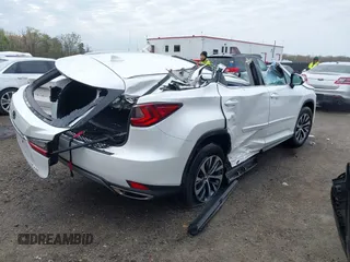 2021 Lexus RX with VIN 2T2HZMDA3MC282824, listed as a IAAI auction lot 42019255 with 1 mi miles. Bid and sale history available at carsss.com. Image 4.