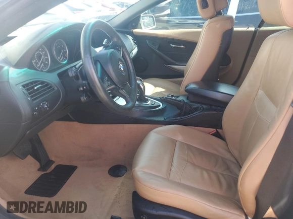 2009 BMW 6 Series 650i with VIN WBAEB53589CX64448, listed as a Copart auction lot 73867784 with 80,795 mi miles and Salvage Title. Bid and sale history available at carsss.com. Image 7.