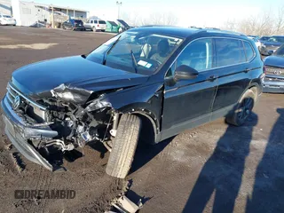 2023 Volkswagen Tiguan SE with VIN 3VVMB7AX8PM032557, listed as a IAAI auction lot 41585975 with 28,706 mi miles and . Bid and sale history available at DreamBid. Image 17.