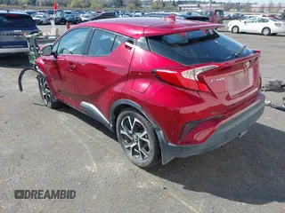 2018 Toyota C-HR XLE z VIN NMTKHMBX9JR023325, wystawiony jako IAAI lot #41926223 z przebiegiem 62 580 mil mil oraz . Historia ofert i sprzedaży dostępna na DreamBid. Obrazek 3.