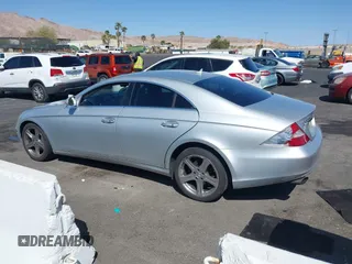 2007 Mercedes-Benz CLS-Class 5.5L with VIN WDDDJ72X17A087032, listed as a IAAI auction lot 42012898 with 174,912 mi miles. Bid and sale history available at carsss.com. Image 3.