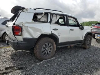 2024 Toyota Land Cruiser z VIN JTEABFAJ9RK004196, wystawiony jako Copart lot #54755695 z przebiegiem Nie podano mil oraz Szkody całkowita. Historia ofert i sprzedaży dostępna na DreamBid. Obrazek 3.