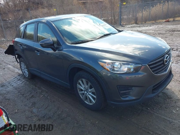 2016 Mazda CX-5 Sport with VIN JM3KE4BY5G0829927, listed as a IAAI auction lot 41678552 with 121,476 mi miles. Bid and sale history available at carsss.com. Image 1.