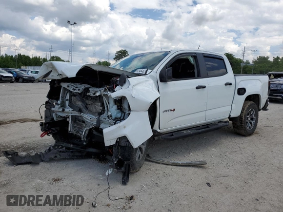 2021 GMC Canyon 4WD AT4 z VIN 1GTG6FEN9M1147406, wystawiony jako Copart lot #55454634 z przebiegiem 82 898 mil mil oraz Szkody całkowita. Historia ofert i sprzedaży dostępna na DreamBid. Obrazek 1.