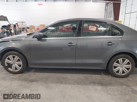 2017 Volkswagen Jetta S with VIN 3VW2B7AJ4HM357707, listed as a IAAI auction lot 42606933 with 124,253 mi miles and . Bid and sale history available at DreamBid. Image 15.