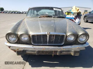 1974 Jaguar XJ with VIN UE2T52398, listed as a Copart auction lot 59589415 with 93,740 mi miles and Clean title. Bid and sale history available at DreamBid. Image 5.