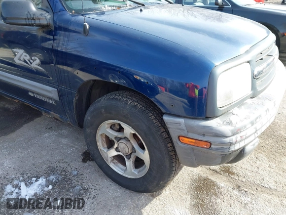 2004 Chevrolet Tracker ZR2 z VIN 2CNBJ734746917149, wystawiony jako IAAI lot #41649562 z przebiegiem 216 092 mil mil oraz . Historia ofert i sprzedaży dostępna na DreamBid. Obrazek 6.
