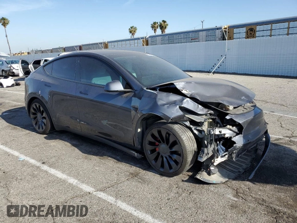 2022 Tesla Model Y Performance z VIN 7SAYGDEF1NF405329, wystawiony jako Copart lot #57249195 z przebiegiem 62 423 mil mil oraz Szkoda całkowita • Salvage title. Historia ofert i sprzedaży dostępna na DreamBid. Obrazek 4.