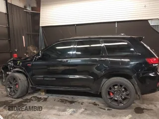 2017 Jeep Grand Cherokee SRT with VIN 1C4RJFDJ9HC819478, listed as a IAAI auction lot 41325490 with 63,551 mi miles. Bid and sale history available at carsss.com. Image 14.