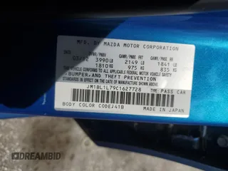 2012 Mazda 3 i Touring z VIN JM1BL1L79C1627728, wystawiony jako Copart lot #62873235 z przebiegiem 44 571 mil mil oraz Szkoda całkowita • Salvage title. Historia ofert i sprzedaży dostępna na DreamBid. Obrazek 13.