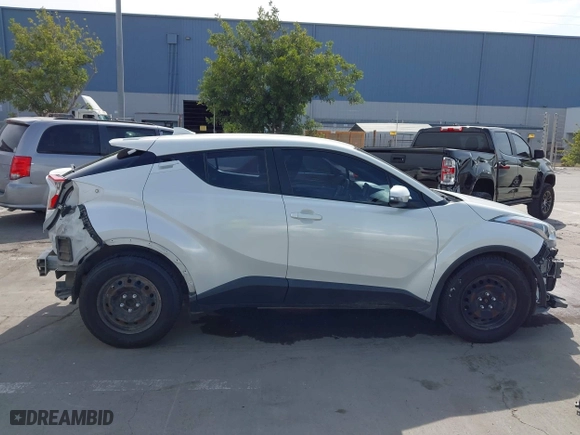 2018 Toyota C-HR XLE with VIN NMTKHMBX4JR049041, listed as a IAAI auction lot 42038397 with 74,930 mi miles. Bid and sale history available at carsss.com. Image 14.