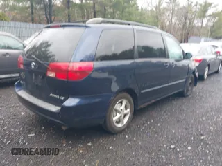 2005 Toyota Sienna CE with VIN 5TDZA23C15S360551, listed as a IAAI auction lot 41823459 with 245,159 mi miles. Bid and sale history available at carsss.com. Image 4.
