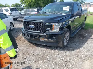 2018 Ford F-150 XL with VIN 1FTEX1CPXJKE63642, listed as a IAAI auction lot 42768090 with 147,219 mi miles and . Bid and sale history available at DreamBid. Image 6.