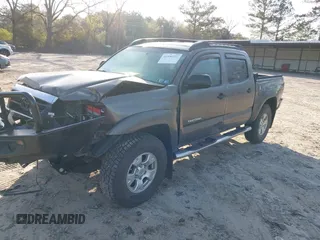 2014 Toyota Tacoma with VIN 3TMLU4EN3EM163162, listed as a IAAI auction lot 41930392 with 167,368 mi miles and . Bid and sale history available at DreamBid. Image 18.