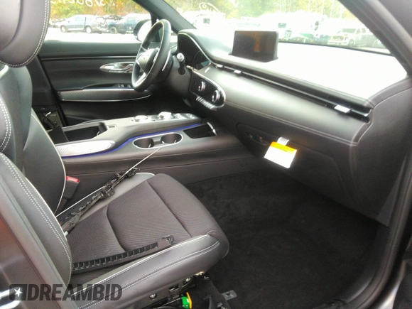 2023 Genesis GV70 2.5T with VIN KMUMADTB5PU139818, listed as a IAAI auction lot 41336368 with 609 mi miles and . Bid and sale history available at DreamBid. Image 5.