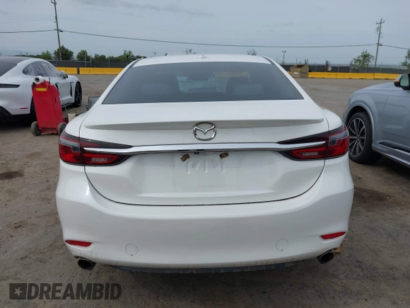 2018 Mazda 6 Grand Touring Reserve with VIN JM1GL1WYXJ1300116, listed as a IAAI auction lot 42088015 with 57,760 mi miles and . Bid and sale history available at DreamBid. Image 16.