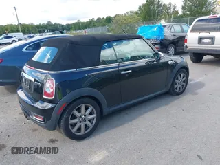 2012 MINI Convertible S z VIN WMWZP3C56CT250533, wystawiony jako IAAI lot #41506301 z przebiegiem 89 854 mil mil oraz . Historia ofert i sprzedaży dostępna na DreamBid. Obrazek 4.