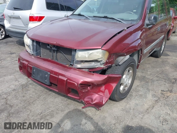 2004 Chevrolet TrailBlazer LS with VIN 1GNDT13S442394308, listed as a IAAI auction lot 42091473 with 214,669 mi miles and . Bid and sale history available at DreamBid. Image 12.