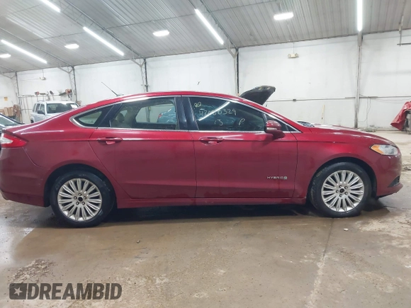 2013 Ford Fusion SE Hybrid with VIN 3FA6P0LU9DR150396, listed as a IAAI auction lot 42080329 with 195,665 mi miles. Bid and sale history available at carsss.com. Image 13.