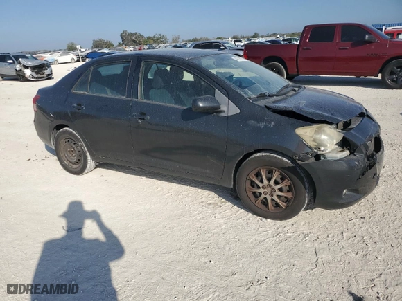2011 Toyota Yaris with VIN JTDBT4K33B1404938, listed as a Copart auction lot 44312955 with 0 mi miles and Salvage Title. Bid and sale history available at carsss.com. Image 4.