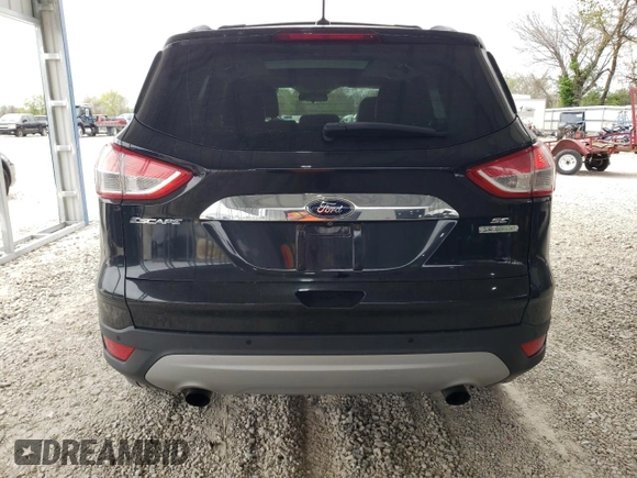 2014 Ford Escape SE with VIN 1FMCU0G91EUE12462, listed as a Copart auction lot 53032685 with 164,421 mi miles and Salvage Title. Bid and sale history available at carsss.com. Image 6.