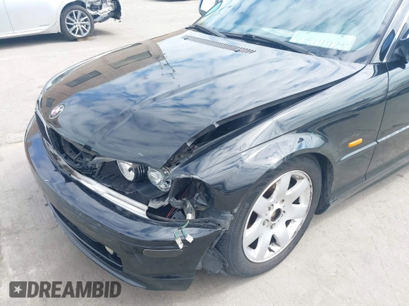2002 BMW 3 Series 325Ci with VIN WBABN33482JW53230, listed as a IAAI auction lot 41912031 with 211,631 mi miles. Bid and sale history available at carsss.com. Image 6.