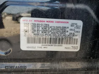 2015 Mitsubishi Outlander SE z VIN JA4AD3A36FZ010050, wystawiony jako Copart lot #56275555 z przebiegiem 171 045 mil mil oraz Szkoda całkowita • Salvage title. Historia ofert i sprzedaży dostępna na DreamBid. Obrazek 13.