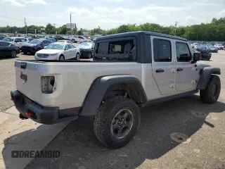 2022 Jeep Gladiator Rubicon z VIN 1C6JJTBG6NL104521, wystawiony jako Copart lot #57325365 z przebiegiem 31 498 mil mil oraz Szkoda całkowita • Salvage title. Historia ofert i sprzedaży dostępna na DreamBid. Obrazek 3.