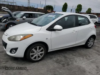 2012 Mazda 2 Touring z VIN JM1DE1LZ6C0133675, wystawiony jako Copart lot #54977405 z przebiegiem 107 334 mil mil oraz Czysty tytuł • Clean title. Historia ofert i sprzedaży dostępna na DreamBid. Obrazek 1.
