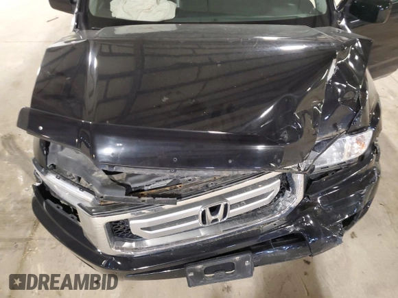 2010 Honda Ridgeline RTL with VIN 5FPYK1F5XAB011944, listed as a Copart auction lot 52434175 with 137,585 mi miles and Salvage title. Bid and sale history available at DreamBid. Image 13.