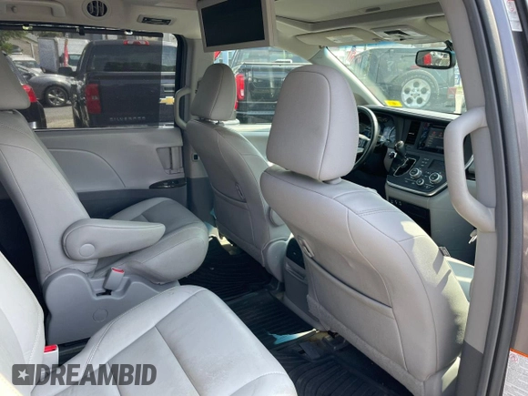 2015 Toyota Sienna Limited с VIN 5TDDK3DC4FS117555, выставлен на аукционе Copart как лот 65460185 с пробегом 141 188 миль миль и Чистый • Clean title. История ставок и продаж доступна на DreamBid. Изображение 7.