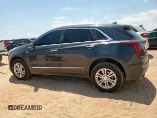 2020 Cadillac XT5 Luxury FWD z VIN 1GYKNAR47LZ173823, wystawiony jako Copart lot #56770025 z przebiegiem 74 192 mil mil oraz Szkoda całkowita • Salvage title. Historia ofert i sprzedaży dostępna na DreamBid. Obrazek 2.