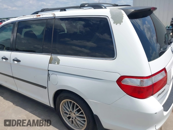 2007 Honda Odyssey LX with VIN 5FNRL382X7B135892, listed as a IAAI auction lot 42223231 with 204,054 mi miles and . Bid and sale history available at DreamBid. Image 19.