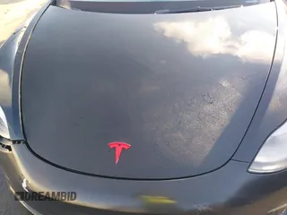 2022 Tesla Model 3 Performance z VIN 5YJ3E1EC7NF137744, wystawiony jako IAAI lot #41427701 z przebiegiem Nie podano mil oraz . Historia ofert i sprzedaży dostępna na DreamBid. Obrazek 10.